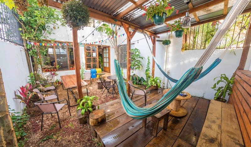 The relaxing patio with hammocks at TripOn Hostel in San José, Costa Rica