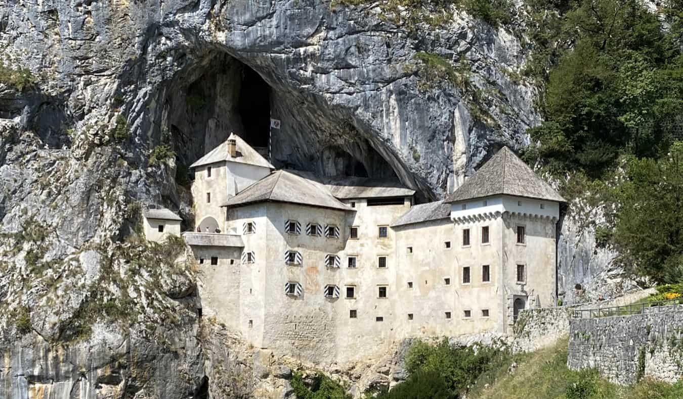 The historic Predjama Castle built into the rock in Slovenia