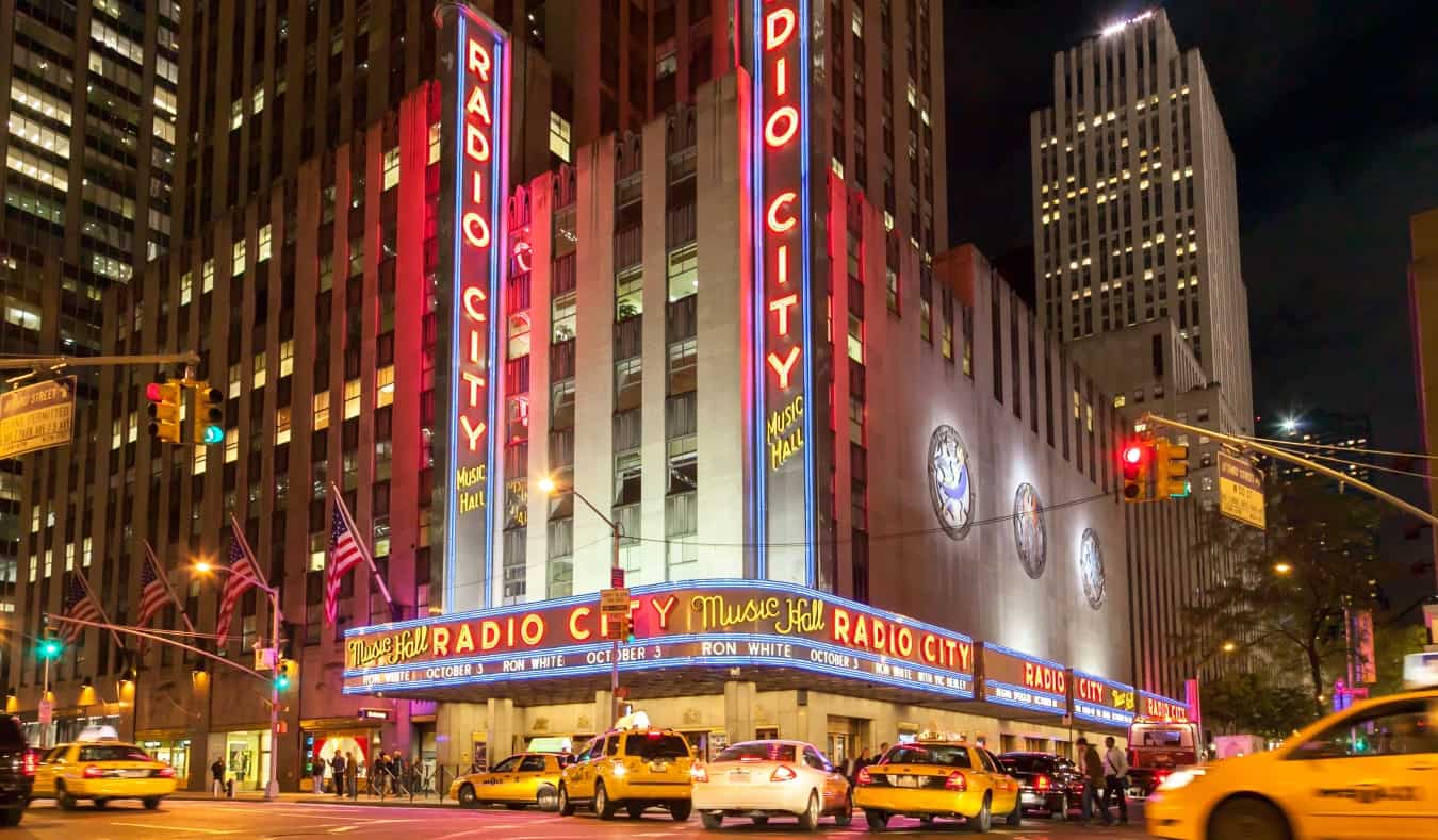 Radio City Music Hall lit up at night in NYC