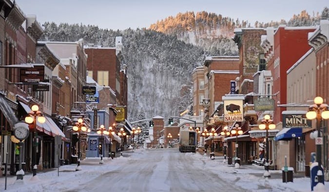 The snowy main street of the historic town of Deadwood, South Dakota