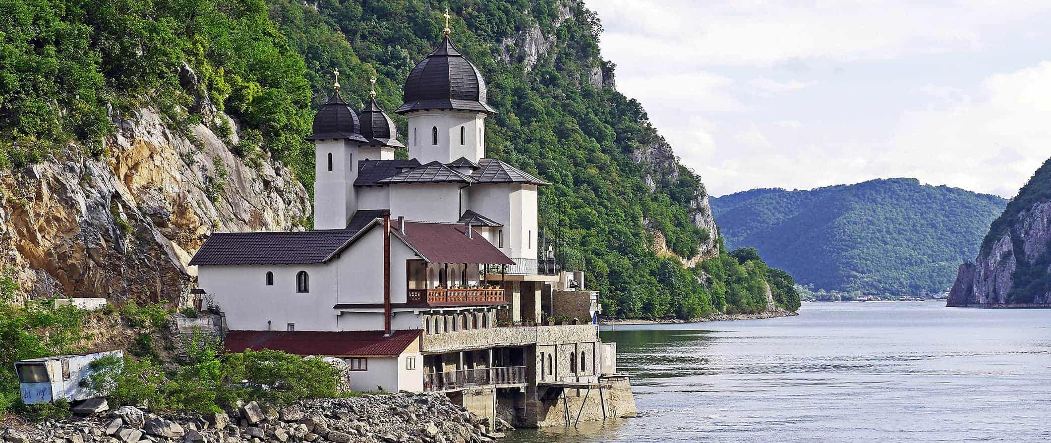 a monastery on a lake in Romania